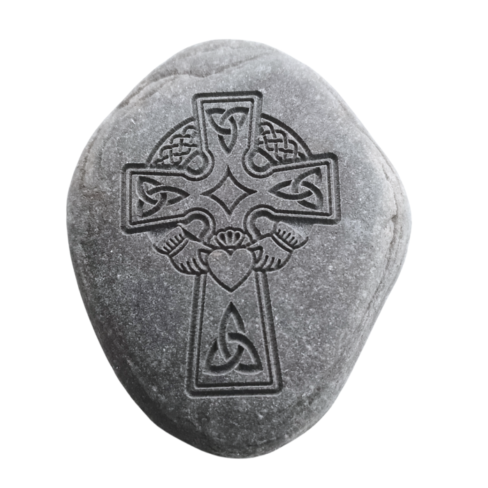 Engraved natural stone featuring a Celtic Cross with Claddagh symbolism, deeply etched for a detailed and lasting design.