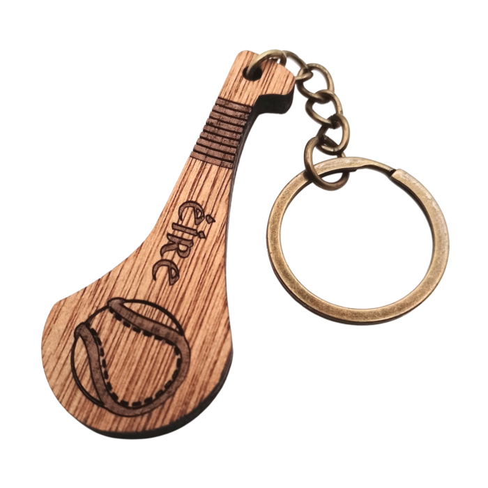 Close-up of hurley keychain with Éire and sliotar design