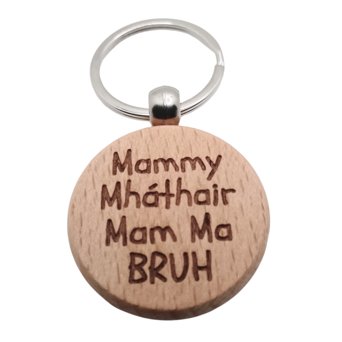 Close-up of wooden keychain with Mammy Mháthair Mam Ma BRUH engraving