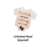 Close-up of an unfinished wood baby onesie tag with engraved name and footprints design.