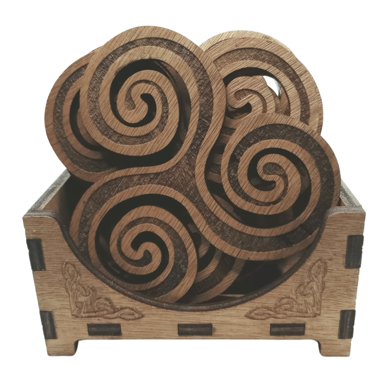 Front view of the coaster set in its storage box, featuring Celtic engravings.