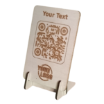 Close-up view of a personalised unfinished plywood QR code sign.