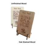 Custom wooden QR code signs in different wood finishes.
