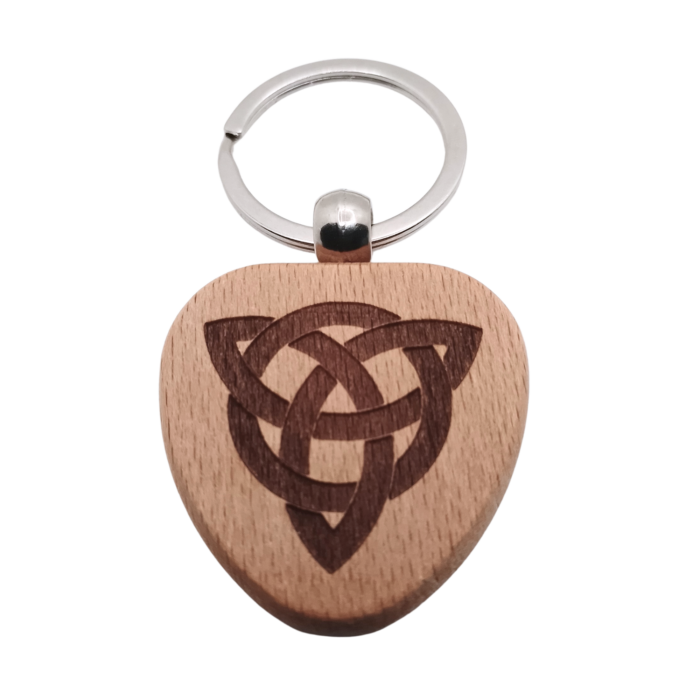 Close-up of wooden keychain with Celtic Triquetra engraving