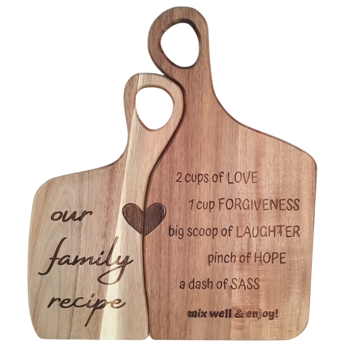 Engraved acacia cutting board set with "Our Family Recipe" design and full text.